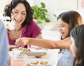 Family enjoying a meal